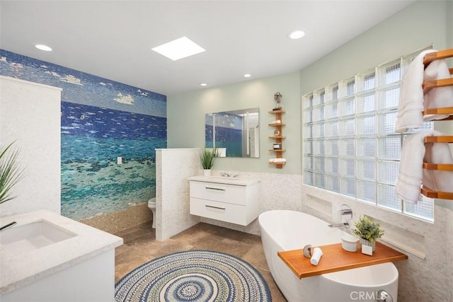 26925 Calle Dolores, Dana Point, CA 92624 - bathroom with tile walls, vanity, a soaking tub, recessed lighting, and toilet