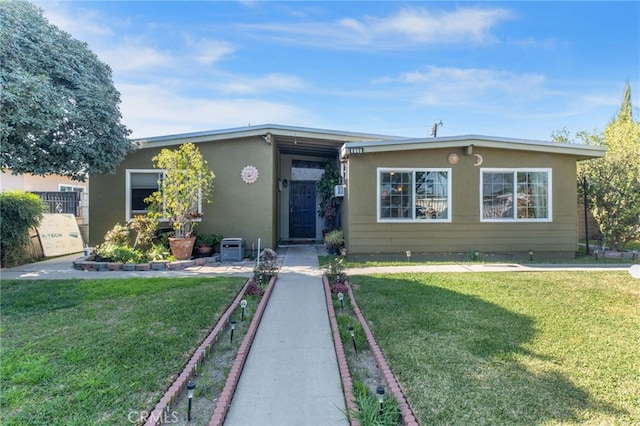 view of front of house with a front yard