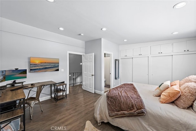 bedroom featuring recessed lighting, dark wood-style flooring, and baseboards