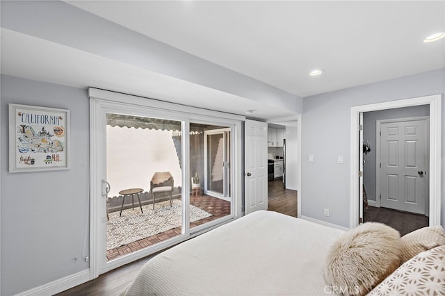 bedroom featuring access to exterior, recessed lighting, and baseboards