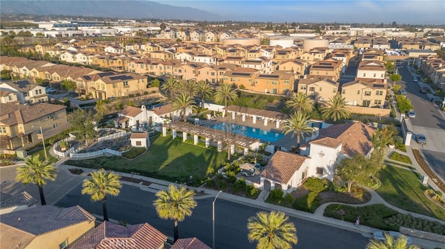 aerial perspective of suburban area with a mountainous background
