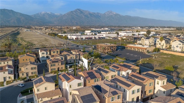 birds eye view of property featuring a residential view and a mountain view