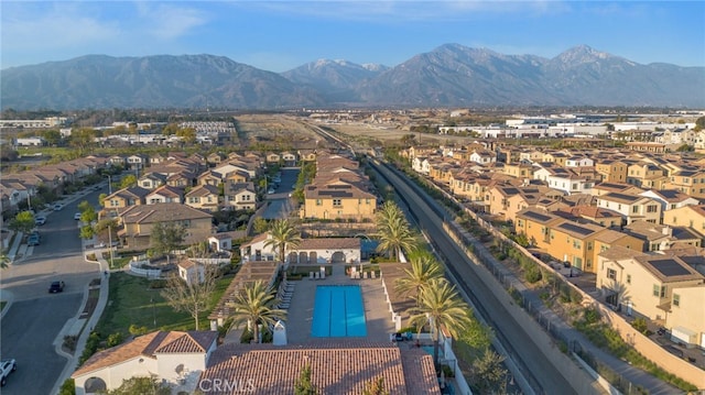 drone / aerial view with a mountain view and a residential view
