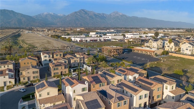 drone / aerial view featuring a mountain view and a residential view