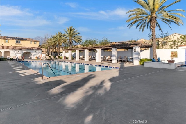 pool with a patio area