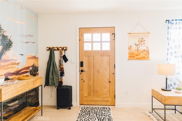 4883 Avenida La Candela, Joshua Tree, CA 92252 - entryway with baseboards and wood finished floors