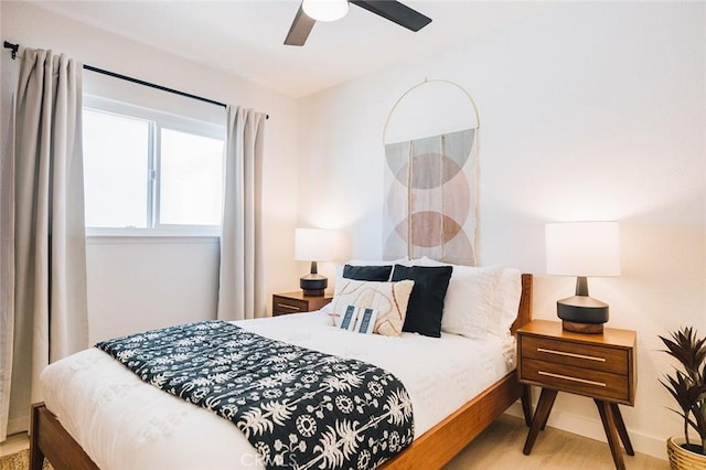 4883 Avenida La Candela, Joshua Tree, CA 92252 - bedroom with wood finished floors and ceiling fan