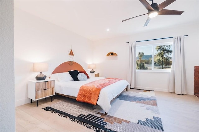 4883 Avenida La Candela, Joshua Tree, CA 92252 - bedroom with wood finished floors, a ceiling fan, and recessed lighting