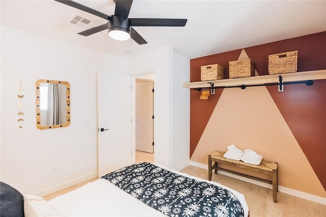 4883 Avenida La Candela, Joshua Tree, CA 92252 - bedroom featuring wood finished floors and a ceiling fan
