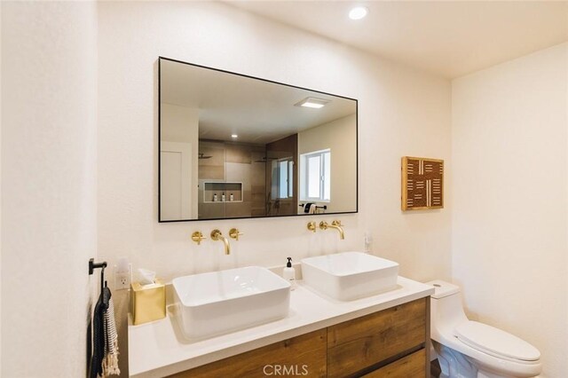 4883 Avenida La Candela, Joshua Tree, CA 92252 - bathroom with double vanity, a shower, and recessed lighting
