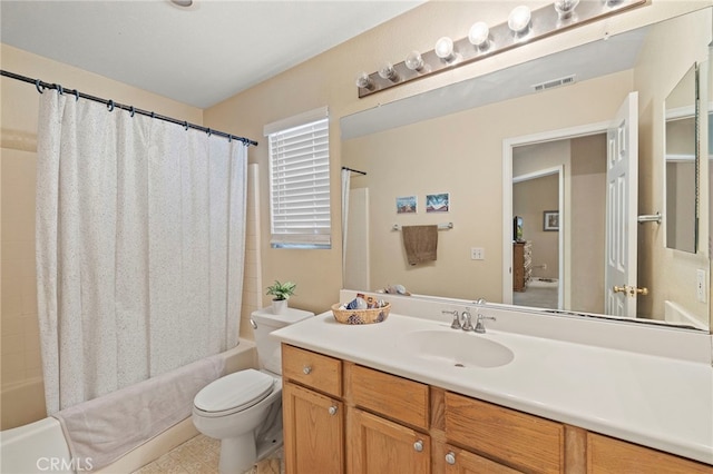 bathroom with toilet, visible vents, shower / tub combo with curtain, and vanity