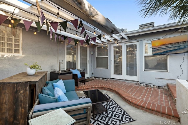 view of patio / terrace featuring an outdoor living space and a pergola