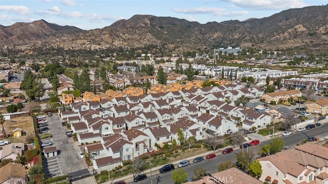 bird's eye view featuring a residential view and a mountain view