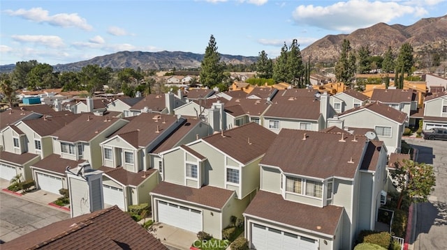 bird's eye view with a residential view and a mountain view