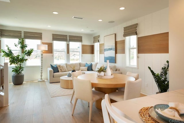 dining space featuring recessed lighting, visible vents, and light wood-style floors