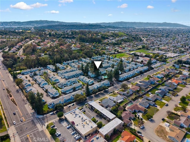 drone / aerial view with a residential view and a mountain view