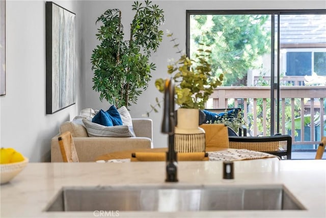 sitting room featuring a wealth of natural light