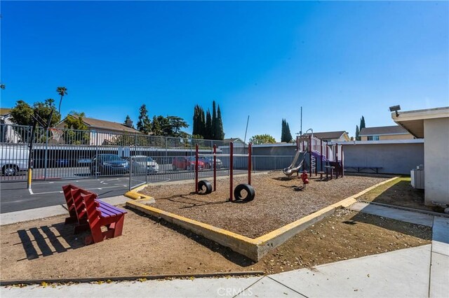 community jungle gym with fence