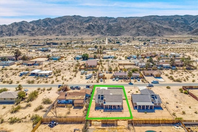 drone / aerial view with a mountain view and a desert view