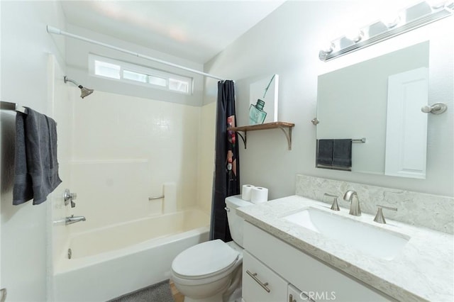 bathroom with toilet, shower / bath combo with shower curtain, and vanity