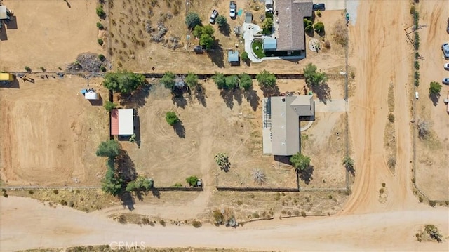 aerial view featuring a desert view