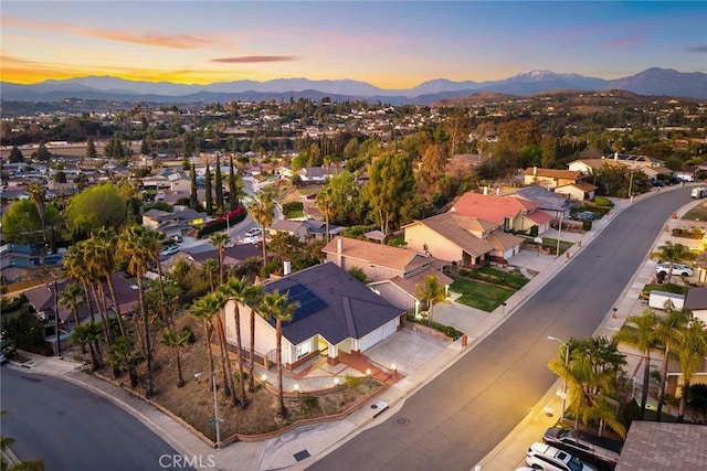 bird's eye view featuring a residential view and a mountain view