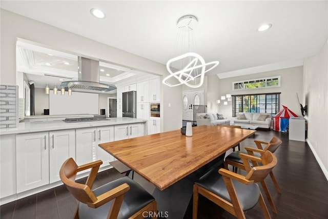 dining area with dark wood-style floors, recessed lighting, a chandelier, and baseboards