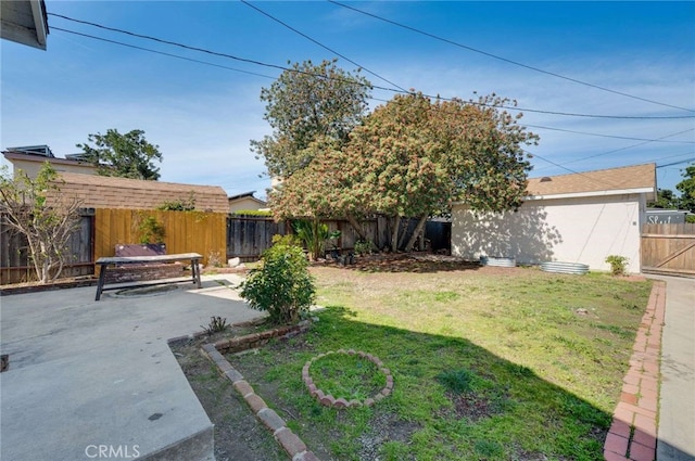 view of yard featuring a fenced backyard and a patio