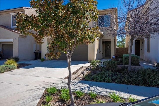 view of front of property featuring driveway and stucco siding