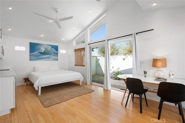 bedroom featuring recessed lighting, high vaulted ceiling, light wood-style floors, and access to outside