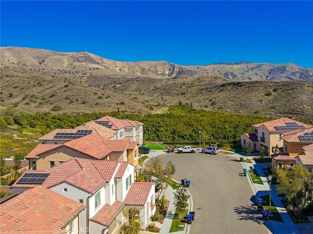 bird's eye view featuring a mountain view and a residential view