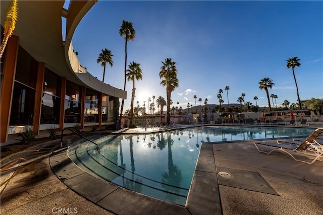 community pool featuring fence