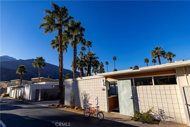 view of front of home with a mountain view