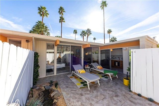 view of patio with fence