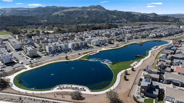 aerial view with a residential view and a water and mountain view