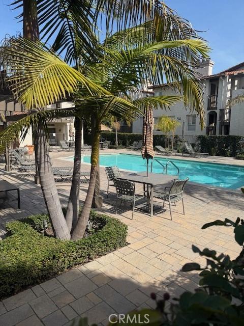 pool with a patio