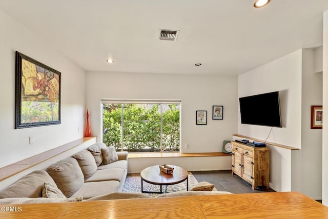 living room with visible vents and recessed lighting