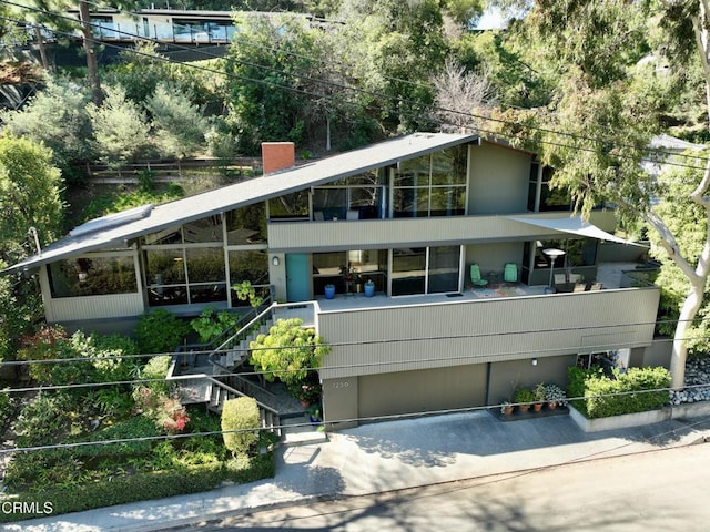 exterior space featuring a balcony