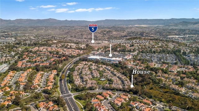 drone / aerial view with a mountain view