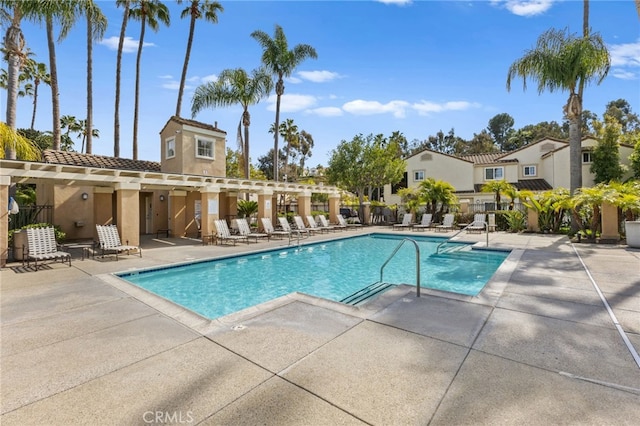 community pool with a patio