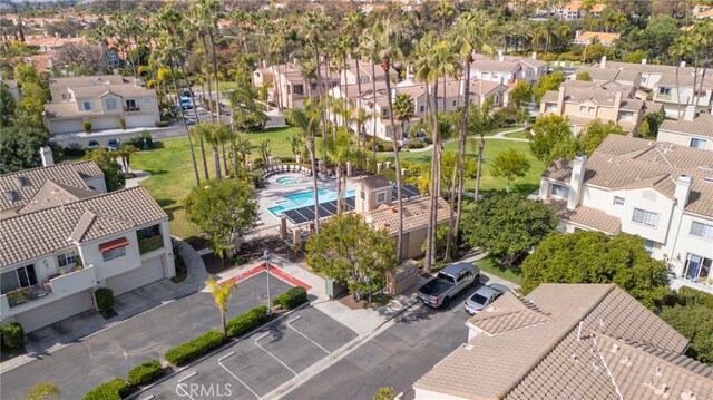 birds eye view of property with a residential view