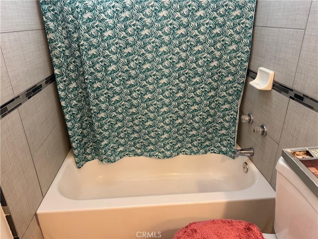 bathroom with a tub