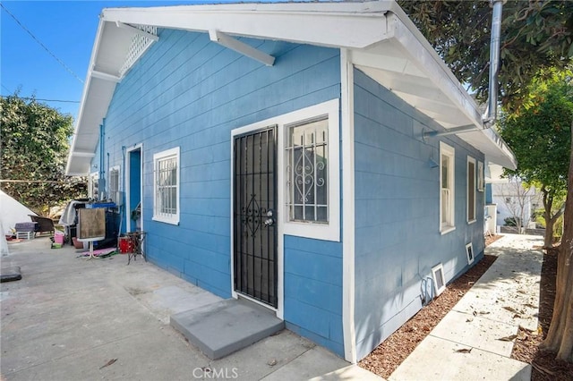 view of home's exterior with crawl space