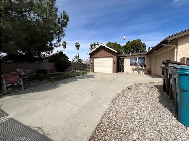 detached garage with fence