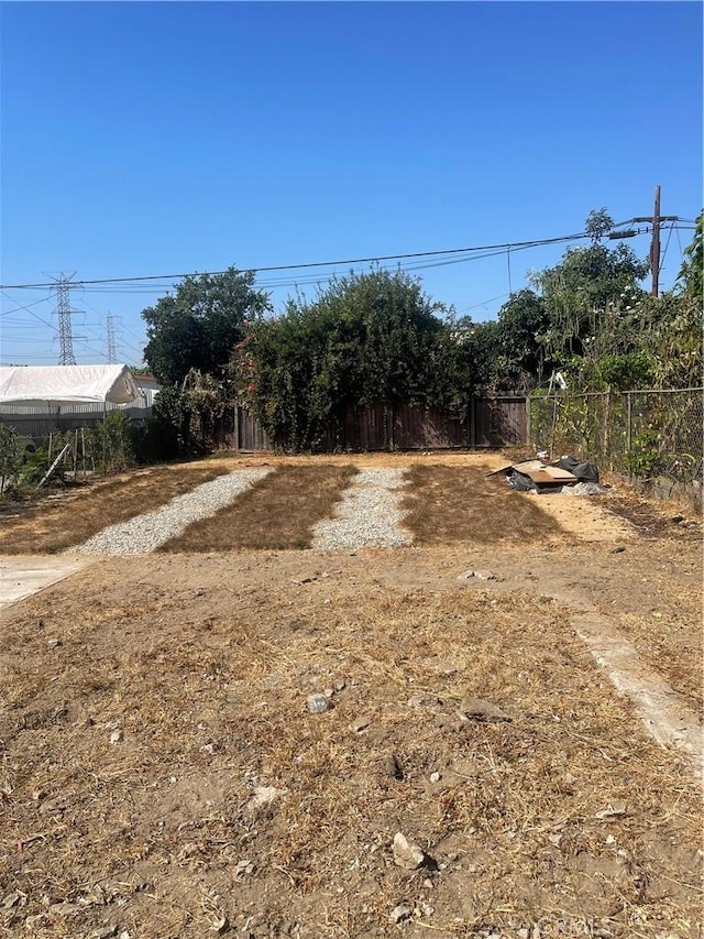 view of yard featuring fence