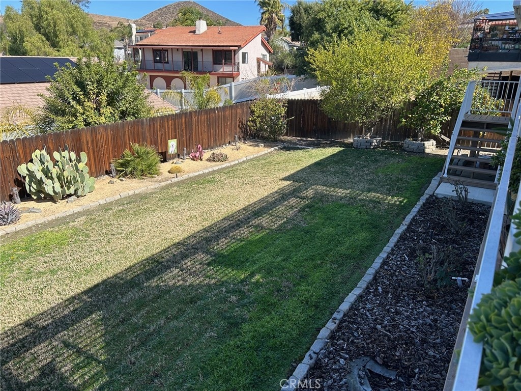 view of yard featuring a fenced backyard