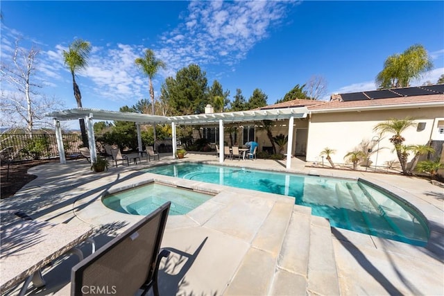 view of pool with a fenced in pool, an in ground hot tub, fence, a patio area, and a pergola