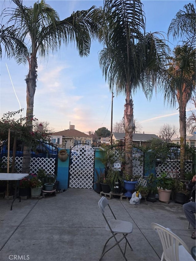 patio terrace at dusk with fence