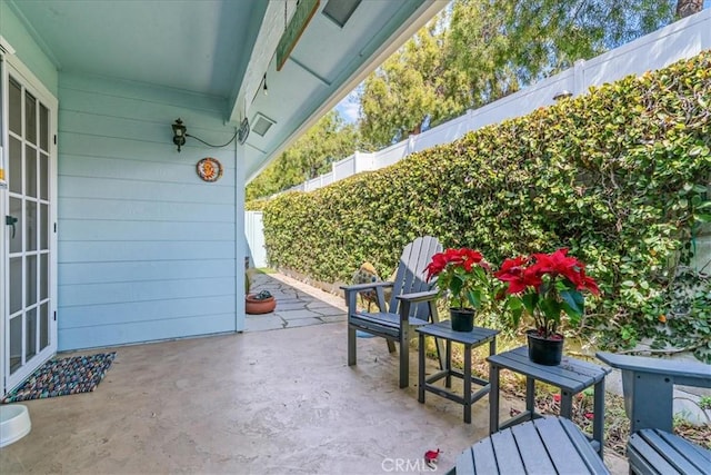 view of patio / terrace with fence