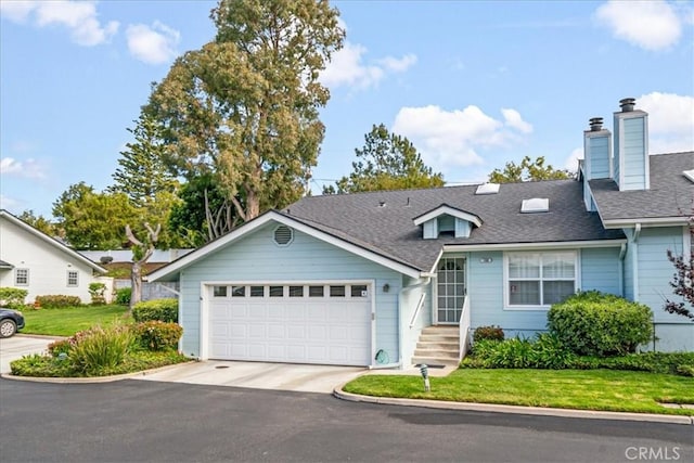 view of front of house featuring driveway, roof with shingles, an attached garage, and a front yard